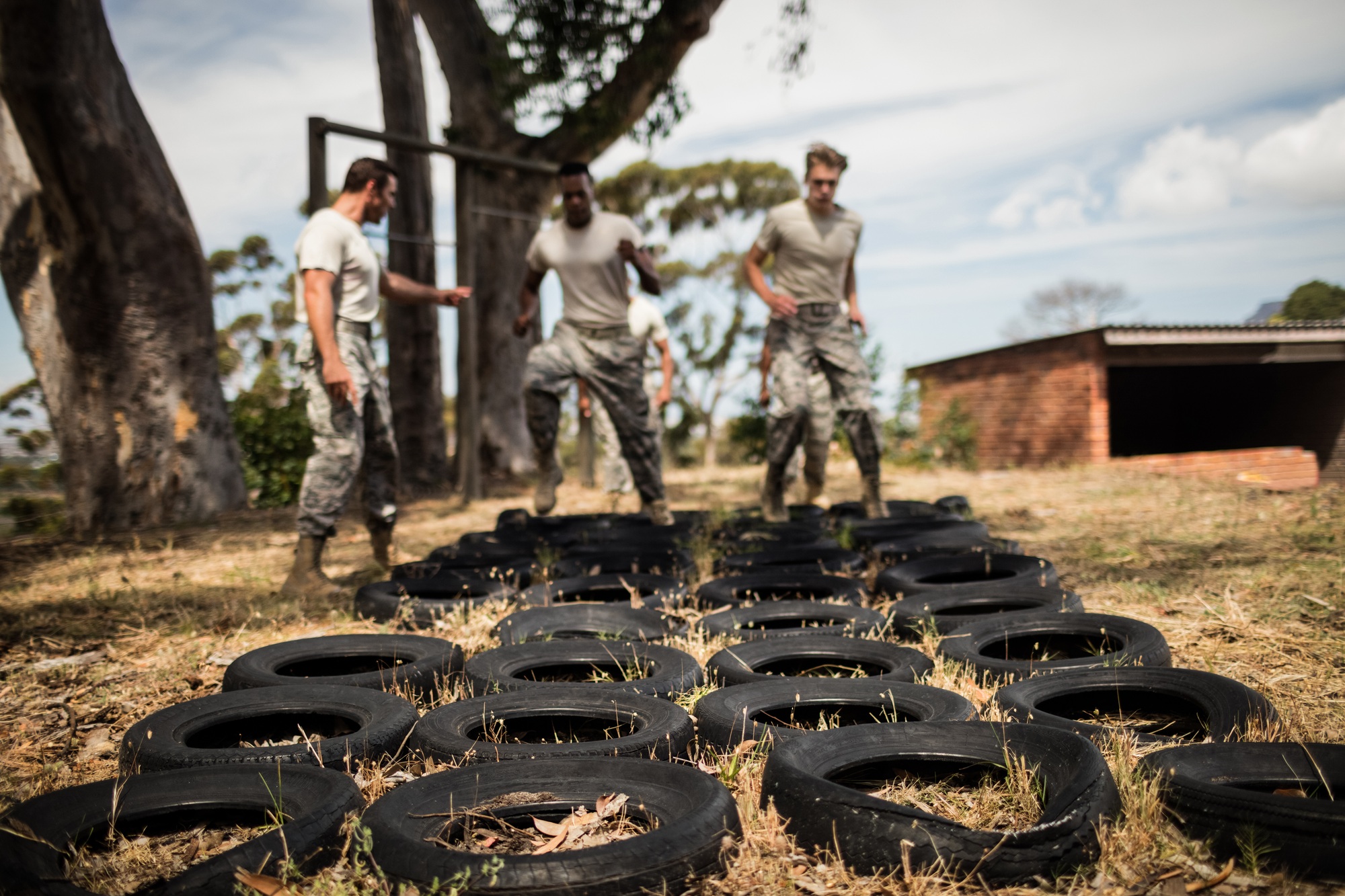 Trainer giving training to military soldiers